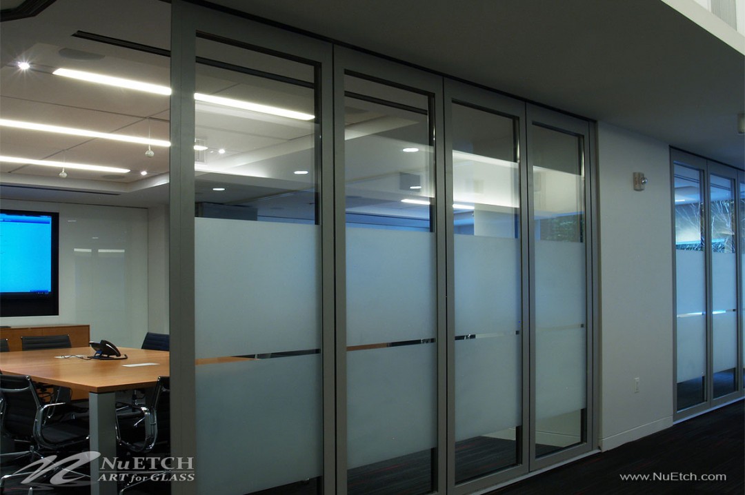Distraction Markers on glass panels and doors in commercial space is required by law in NYC