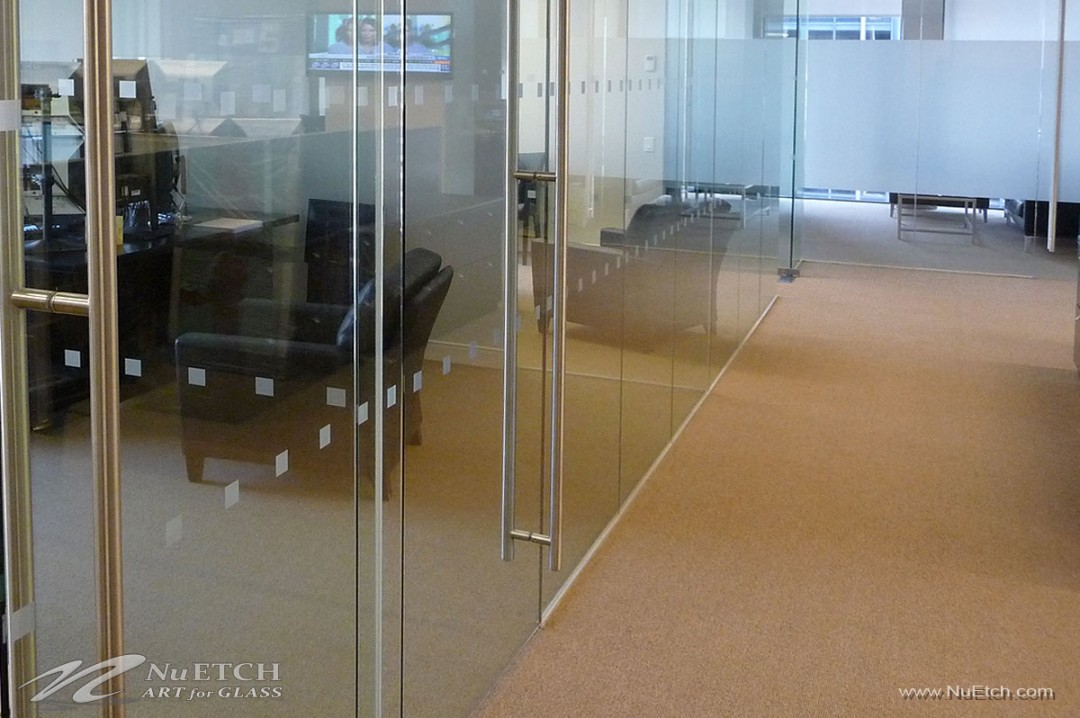 Distraction Markers on glass panels and doors in commercial space is