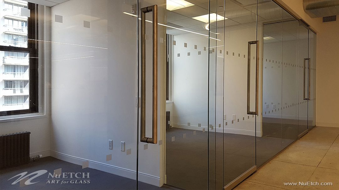 Distraction Markers on glass panels and doors in commercial space is required by law in NYC