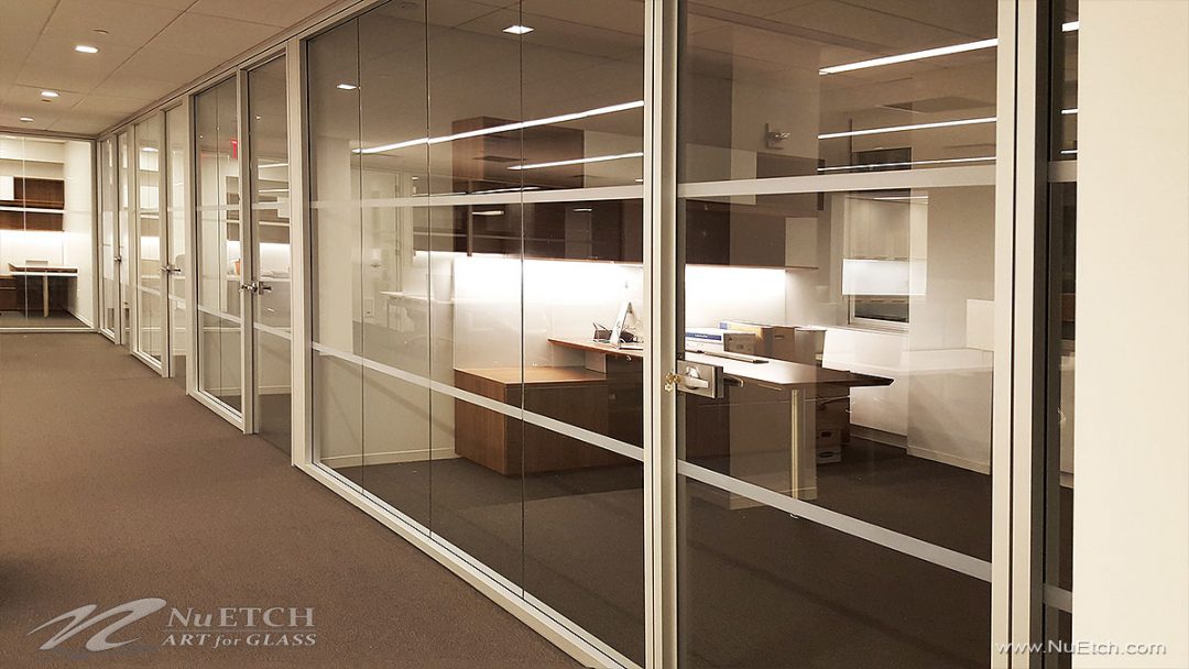 Distraction Markers on glass panels and doors in commercial space is required by law in NYC
