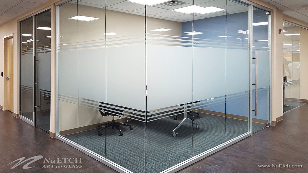 Distraction Markers on glass panels and doors in commercial space is required by law in NYC